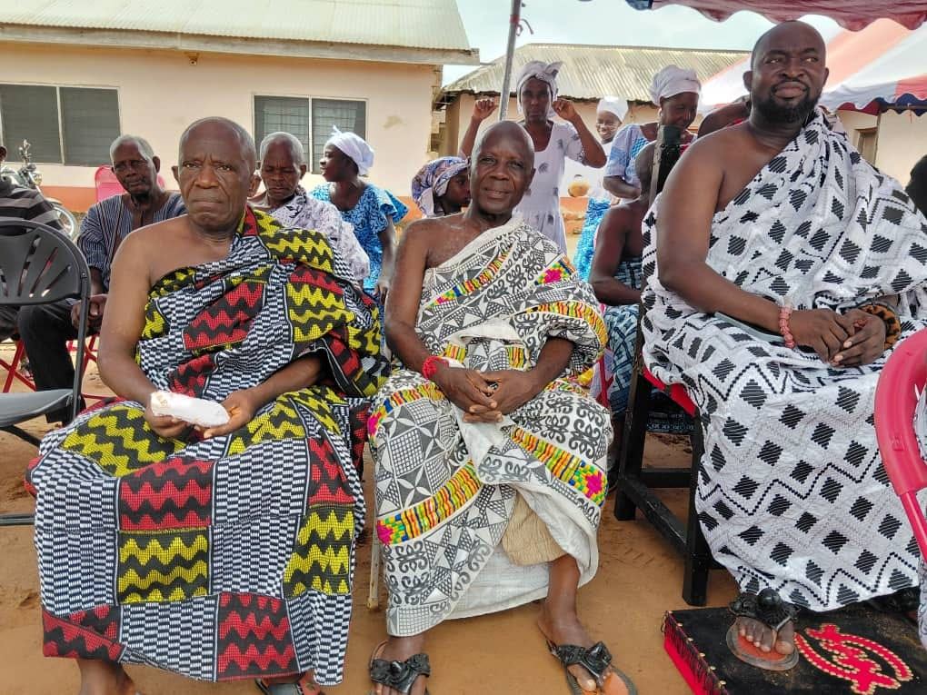 Elders of the Fodome Traditional Council in kente cloth, gathered for the Stool Cleaning Rites