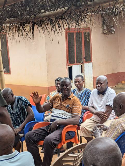 Members of the Fodome Amele community meeting together.